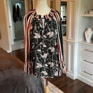 Peasant style blouse.